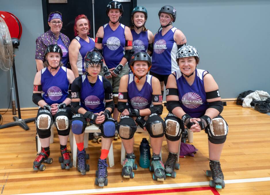 The Slammerais and Rolling Dead battle each other in a roller derby showdown. Pictures by Enzo Tomasiello