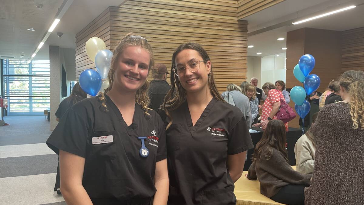 Nursing and midwifery students Lily Davidson and Arkie Donnelly are excited they will be paid for their clinical placements. Picture by Jonathon Magrath 