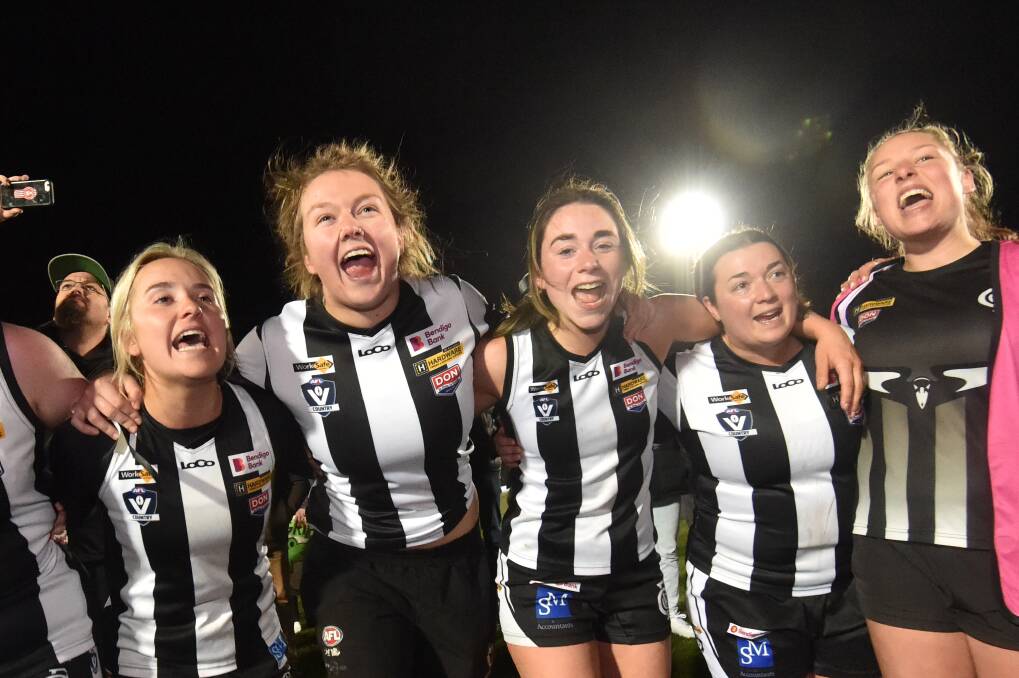 The Magpies players belt out the song on the far wing of the QEO straight after the final siren. Picture by Darren Howe 