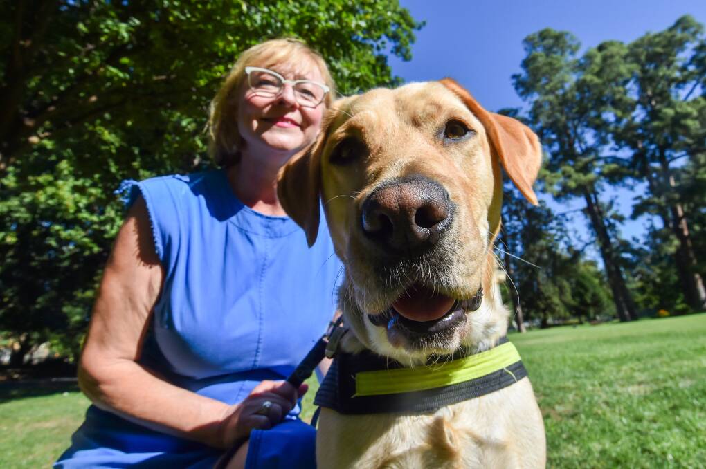Clare Opie and seeing eye dog Mabel preparing for the Easter egg hunt in Rosalind Park. Picture by Darren Howe