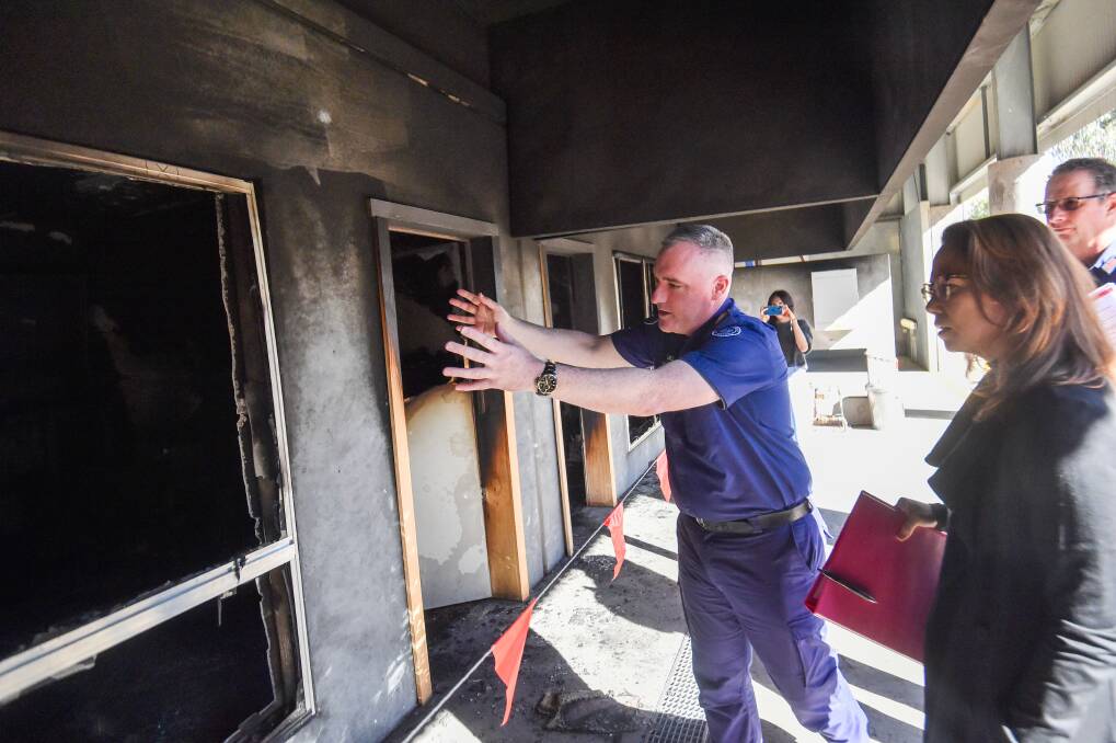CFA Chief Officer Jason Heffernan shows how trainees will see investigate the training rooms. Picture by Darren Howe