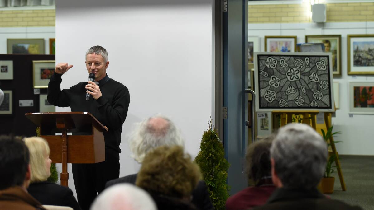 Canon Bryn Jones speaks at last year’s Winter Art Show at St Mary’s Anglican Church in Kangaroo Flat. This year’s art show will be officially opened tomorrow evening at will run through to Sunday. Picture: JODIE WIEGARD