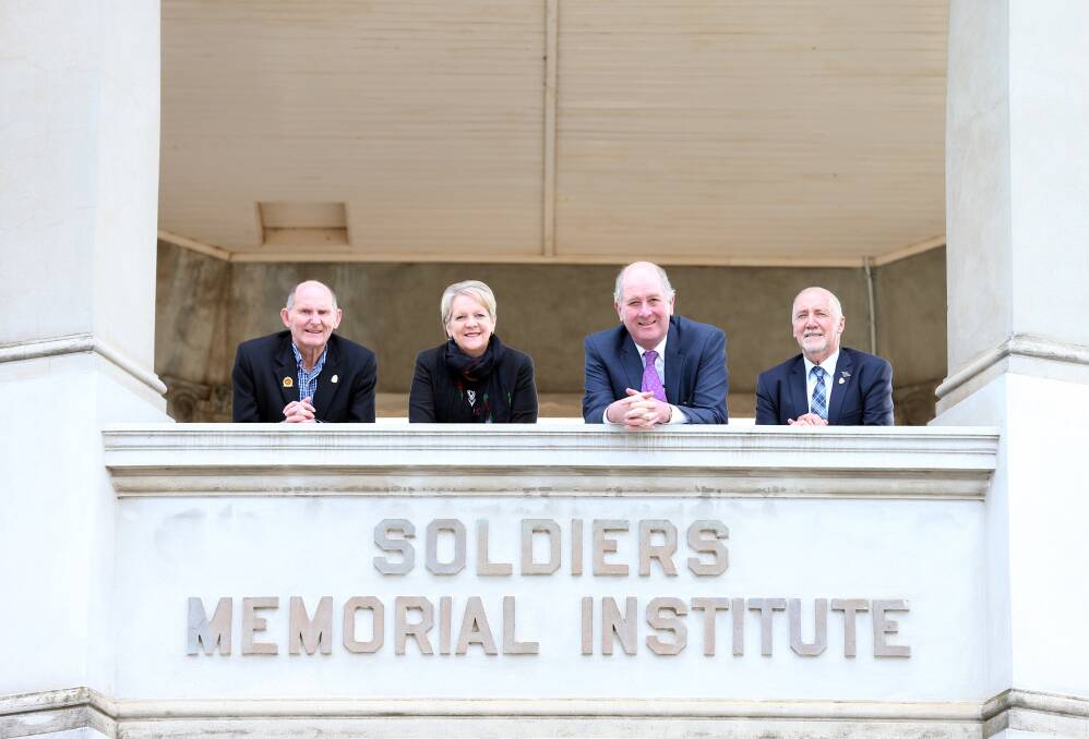 Soldiers Memorial Institute volunteer curator Peter Ball, Member for Bendigo West Maree Edwards, Minister for Planning Richard Wynne, and SMI redevelopment committee chairman Paul Penno. Picture: GLENN DANIELS