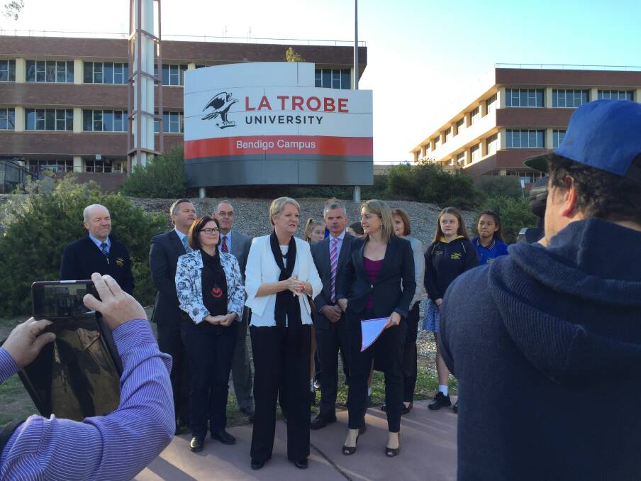 State MPs Maree Edwards and Jacinta Allan address the media with federal MP Lisa Chesters and school principals and students at the site of Bendigo's new tech school. Picture: JASON WALLS