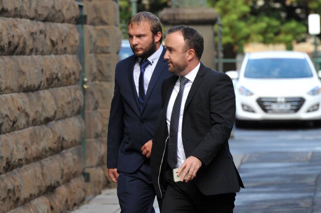 Accused: Joby Rowe (left) arrives at the Supreme Court in Bendigo for his child homicide trial with lawyer, Alex McLennan. Picture: NONI HYETT