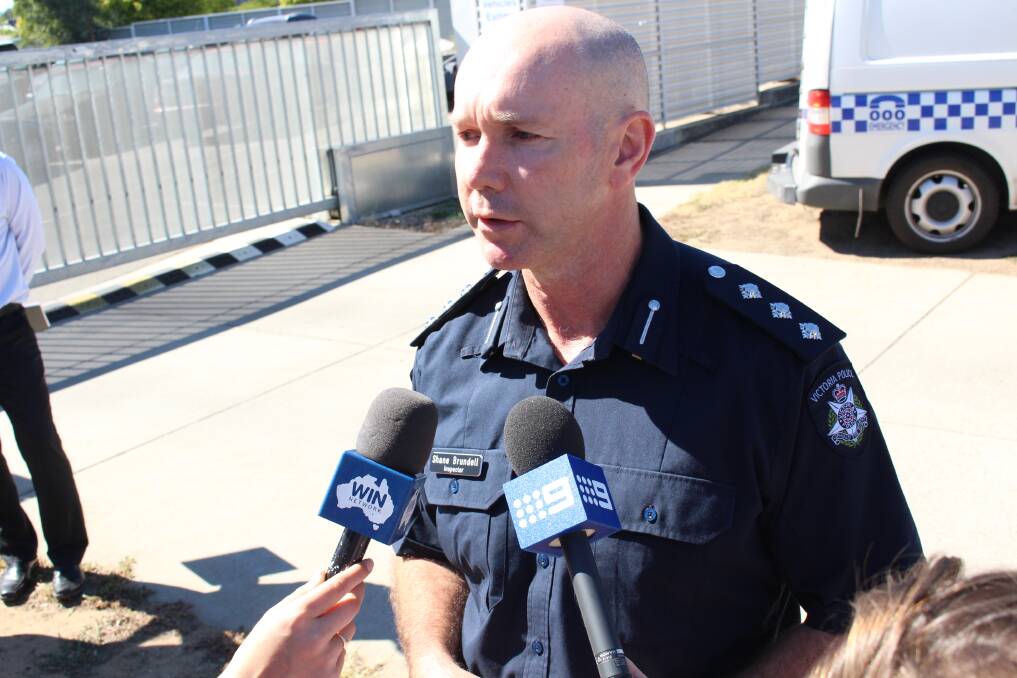 Local area commander Shane Brundell addresses the media outside the Bendigo police station in March.