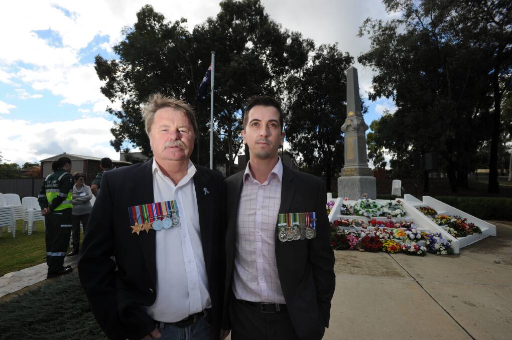 Glen Shilling and son-in-law Michael Burnett at the Kangaroo Flat Anzac Day service. Picture: NONI HYETT
