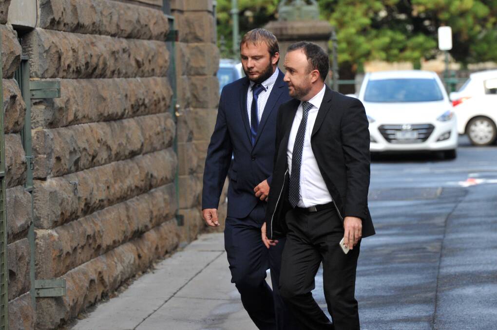 Joby Rowe (left) arrives at the Supreme Court in Bendigo for his child homicide trial with lawyer, Alex McLennan. Picture: NONI HYETT
