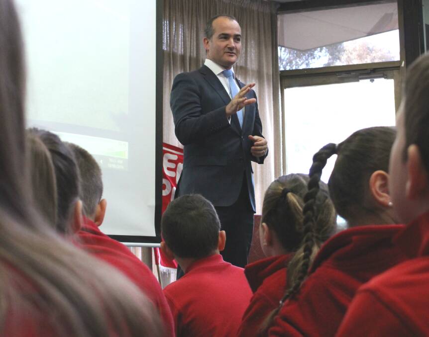 Education Minister James Merlino speaks to students at Epsom Primary School on Wednesday morning. Picture: JASON WALLS