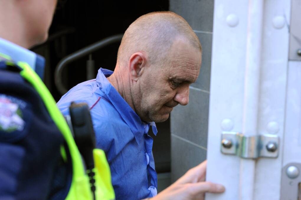 Michael Darmody arrives at the Bendigo Magistrates' Court in 2012. Picture: PETER WEAVING