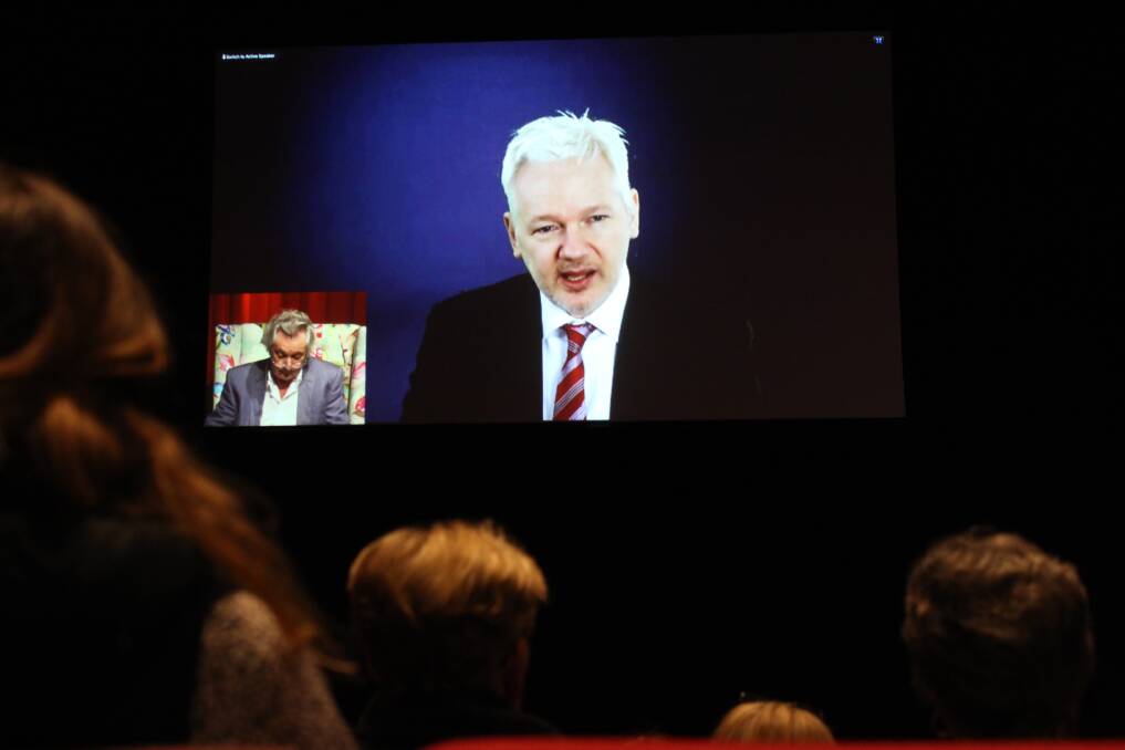 Julian Assange speaks with Robert Manne at the Ulumbarra Theatre as part of the 2016 Bendigo Writers Festival. Picture: JASON WALLS