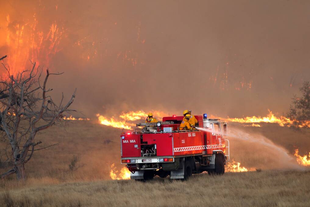 CFA crews battle bushfires near Blackhill Road, north of Kyneton in January. Picture: GLENN DANIELS