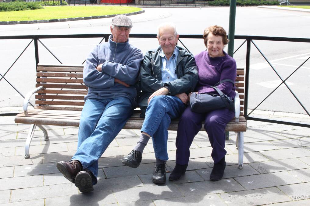 Dermott Power, Russell Patterson and Shirley Patterson wait for grand final tickets to go on sale in Bendigo on Sunday. Picture: JASON WALLS