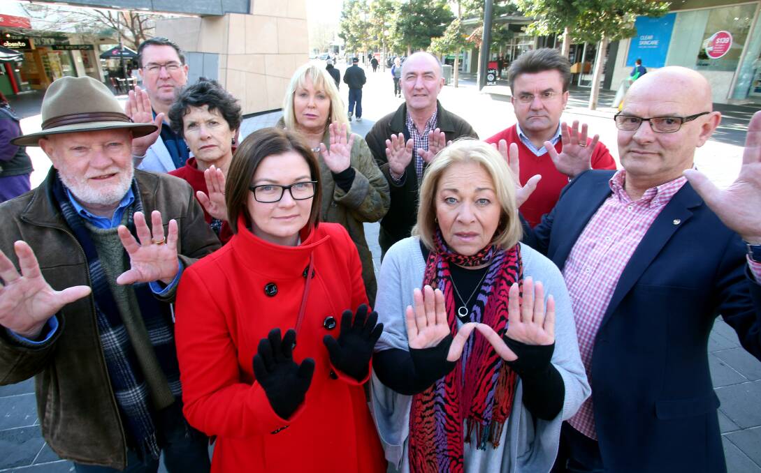 Stop: Peter Cox and Lisa Chesters were among those joining Colleen Hewett in saying no to family violence. Picture: GLENN DANIELS