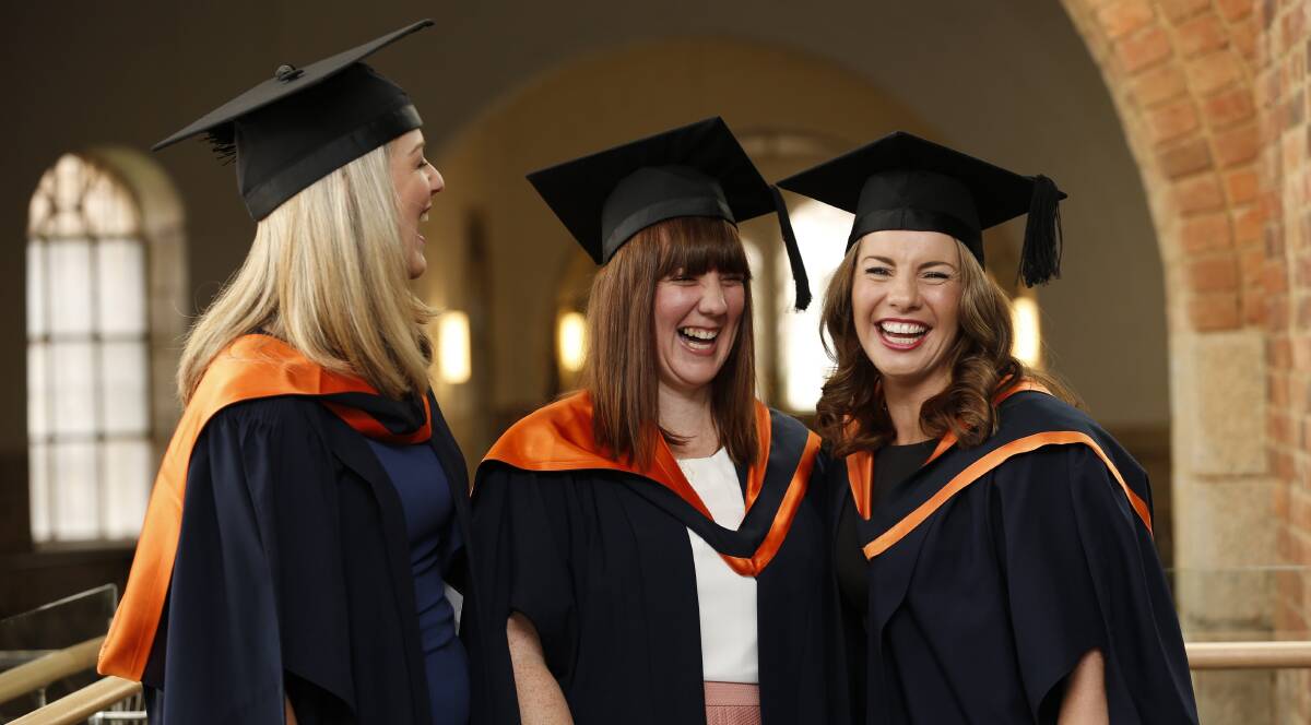 Masters: Lauren Andrews, Jessica Burrows and Ginerva Johnson at their graduation ceremony this week. Picture: CONTRIBUTED