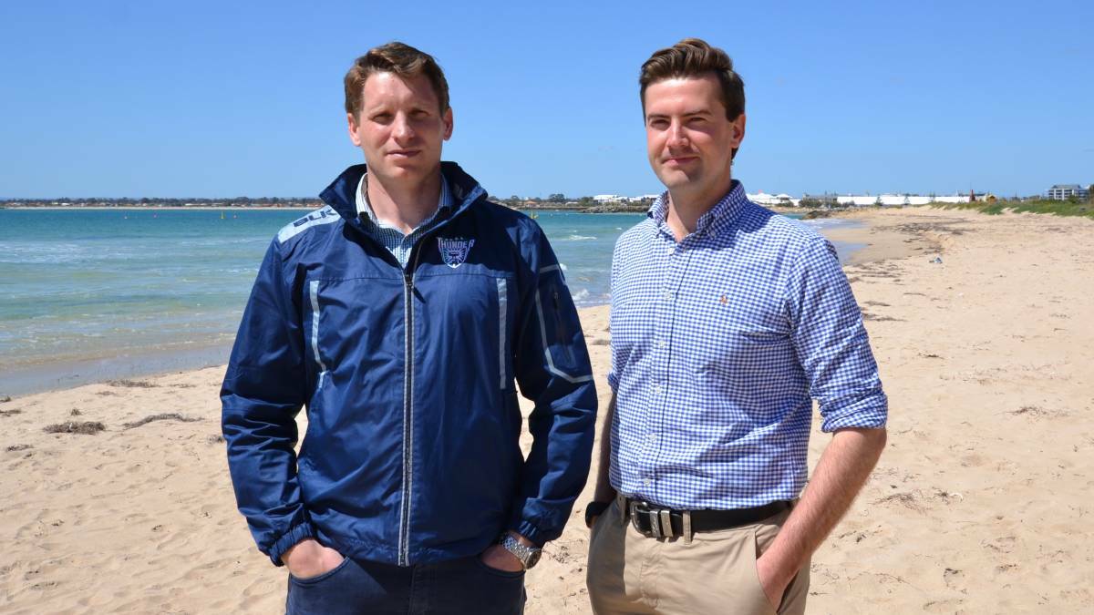 Canning MP Andrew Hastie and Dawesville MP Zak Kikrup campaign for more shark barriers in 2016. Photo: Nathan Hondros.
