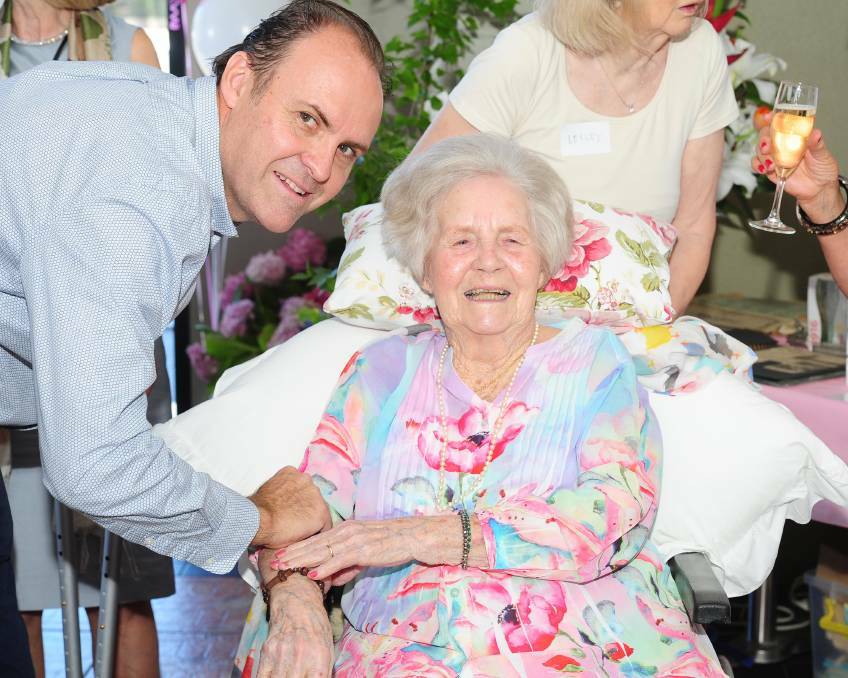 MILESTONE: Amy Isabel Jones with her grandson Tim Wild at her 100th birthday celebrations in Wagga at the weekend. Pictures: Kieren L Tilly