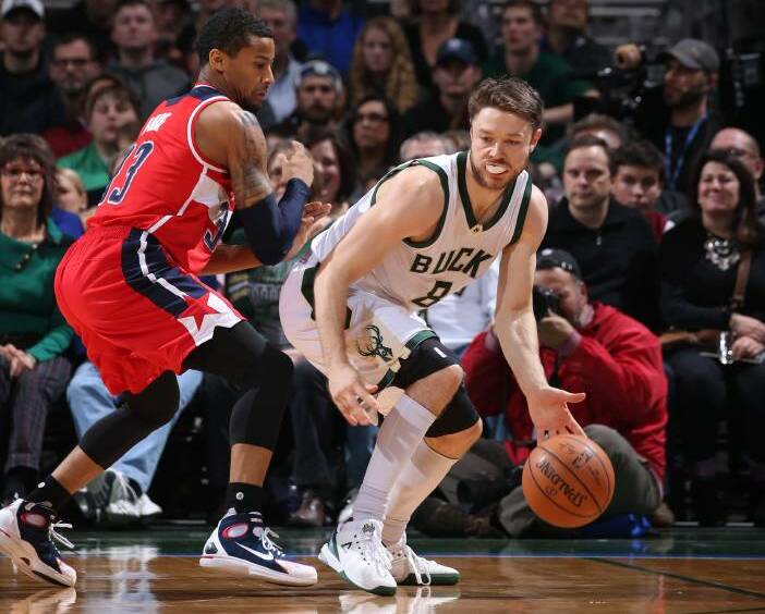 SAFE HANDS: Matthew Dellavedova takes on the Washington defence in Milwaukee's five-point loss to the Wizards. Picture: GETTY IMAGES