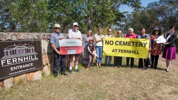 Minister Tanya Davies, the local member for Mulgoa (pictured far right), with local residents at the entrance to Fernhill estate.  Photo: Supplied