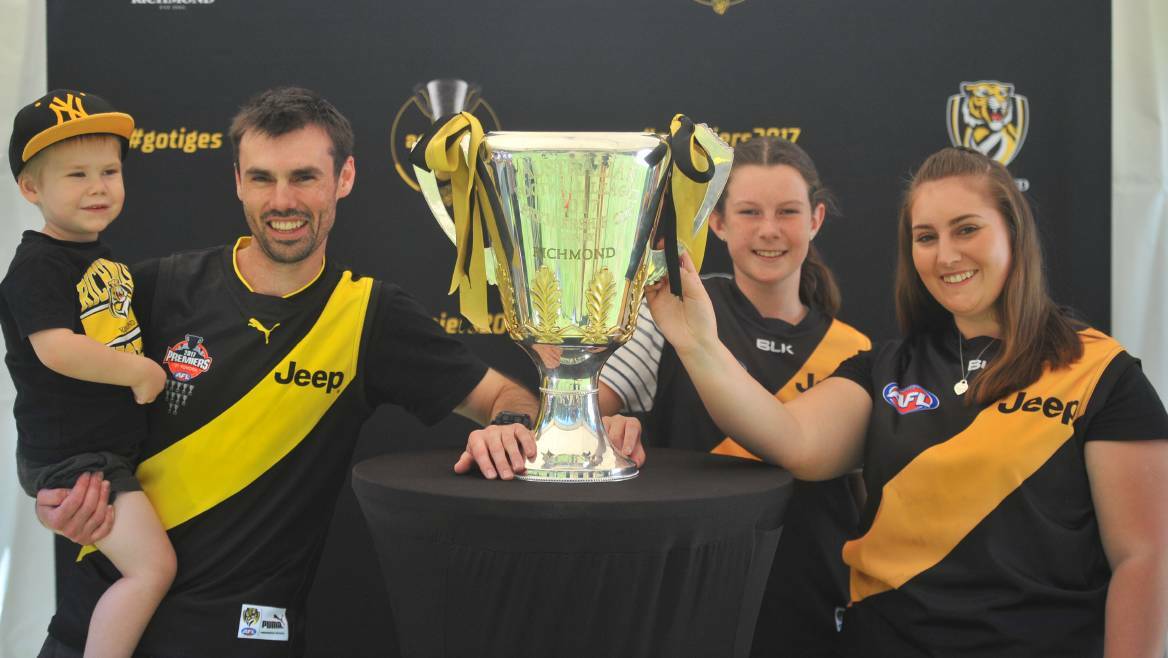 <b> CLICK FOR MORE: Tiger fans jump at chance to get hands on premiership cup </b>