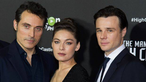 Rufus Sewell (left), Alexa Davalos and Rupert Evans, stars of the Amazon original series The Man in the High Castle. Photo: Charles Sykes/AP