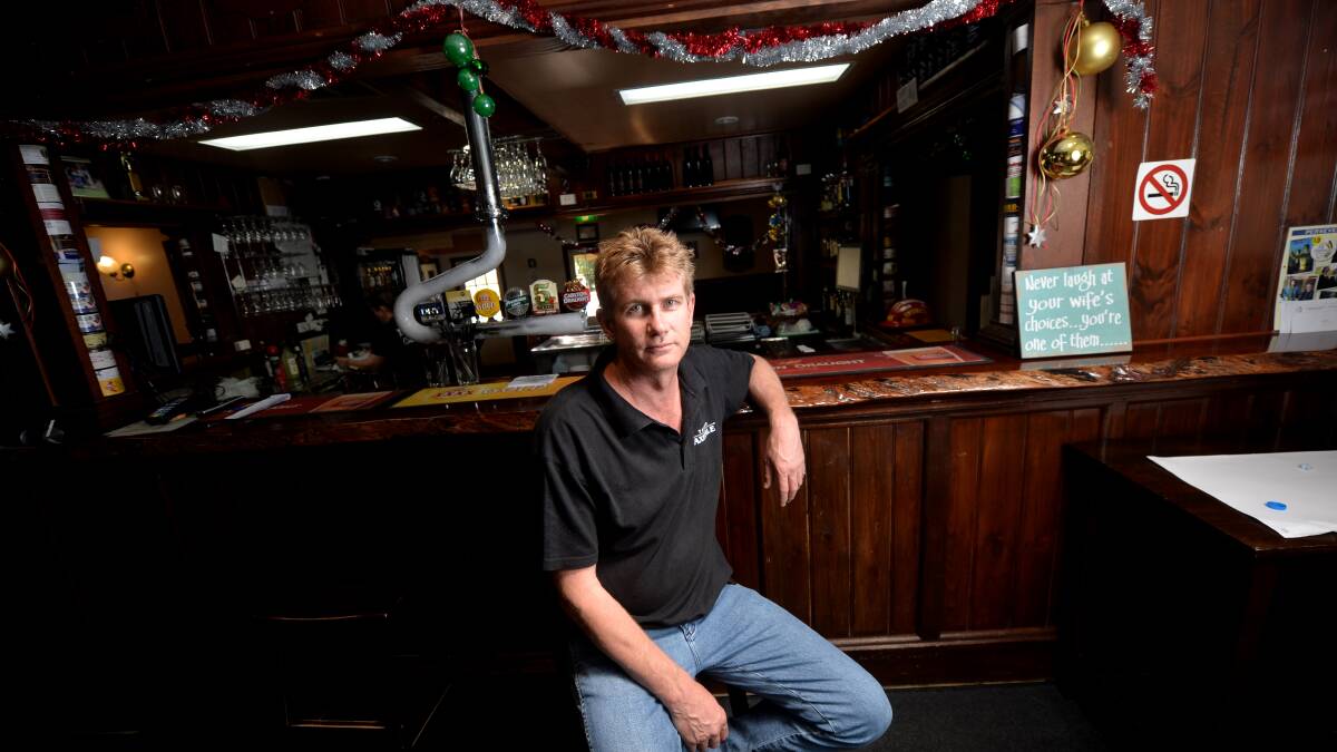Axedale Tavern owner Garry Van Wynen is fed up with thieves breaking in and stealing charity tins, costing local families in need. Picture: DARREN HOWE