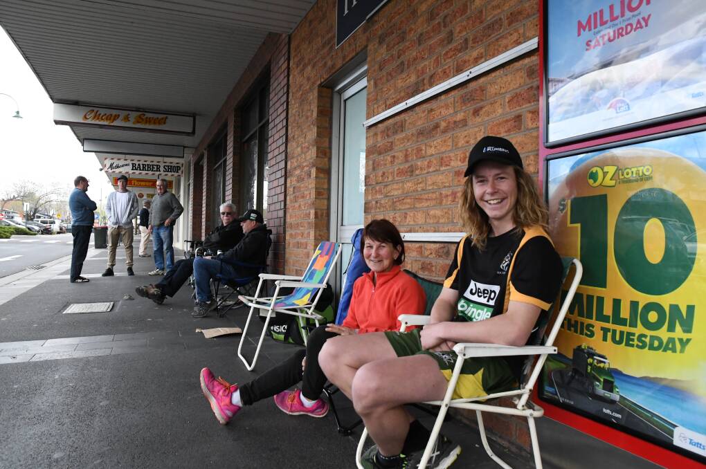 Joanne Dehne and Blake Cooke are among those staking out their places on Lyttleton Terrace to secure tickets to the 2017 AFL Grand Final. Picture: ADAM HOLMES