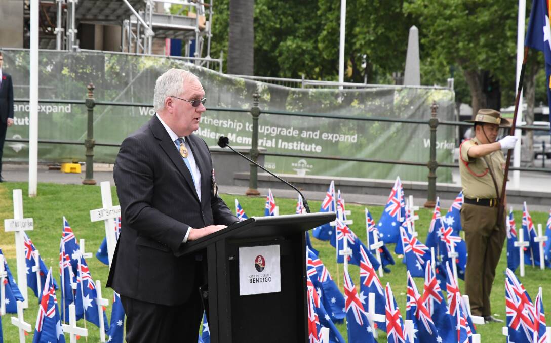 VCAT president Greg Garde speaks during the service in Rosalind Park this week. Picture: ADAM HOLMES
