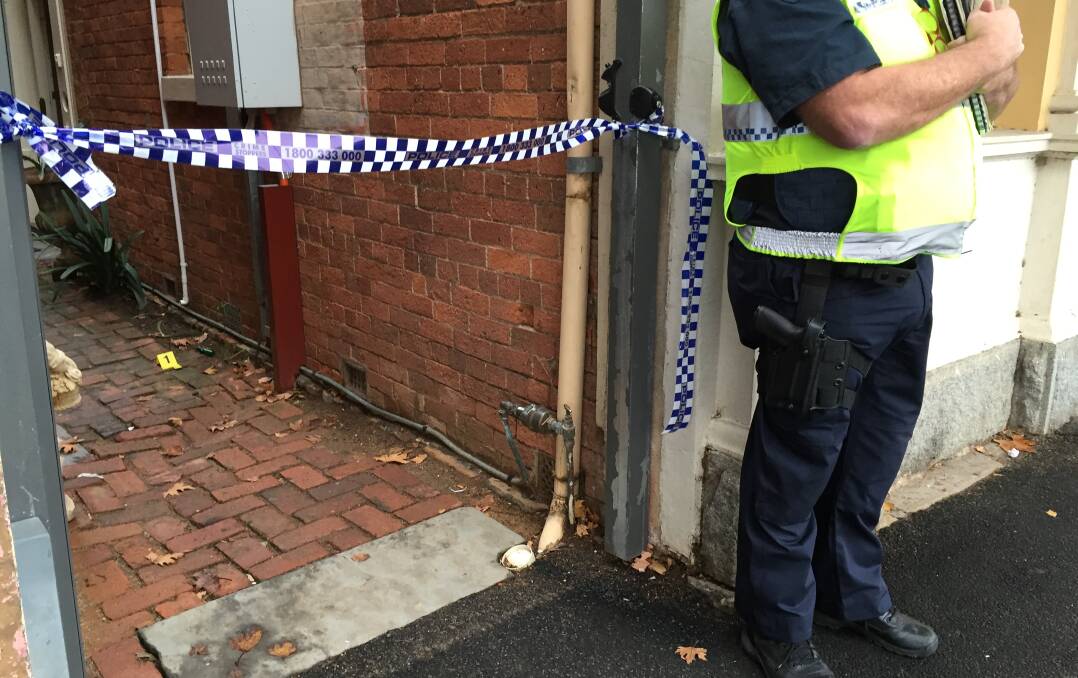 Police at the scene of the bow and arrow shooting at a premises on High Street, Eaglehawk, on June 9, 2016.