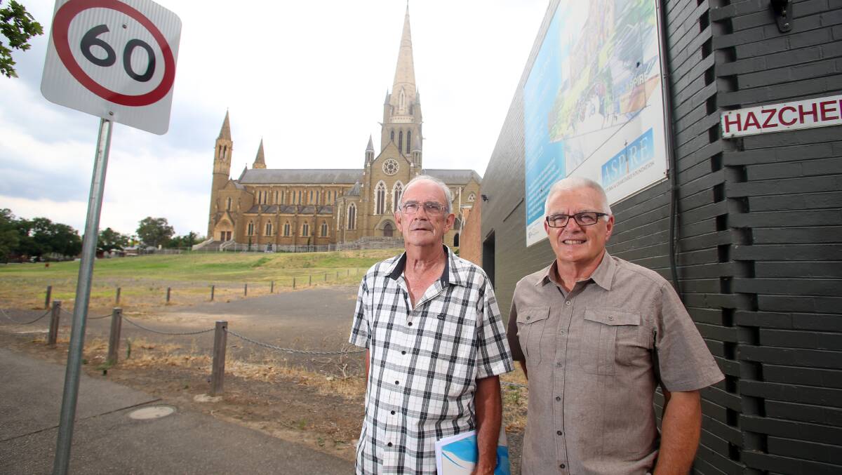 Max Turner and Alan Ellis are among the nearby residents who say parking near Sacred Heart Cathedral will become more of a problem when the Aspire Precinct is complete. Picture: GLENN DANIELS
