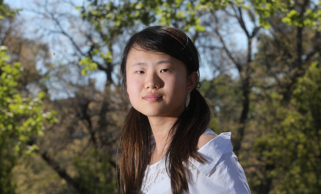 Xiaoyan Wang has overcome struggles during her time studying in Bendigo - from making friends to working at a local footy club, she documented her journey through film. Picture: DARREN HOWE