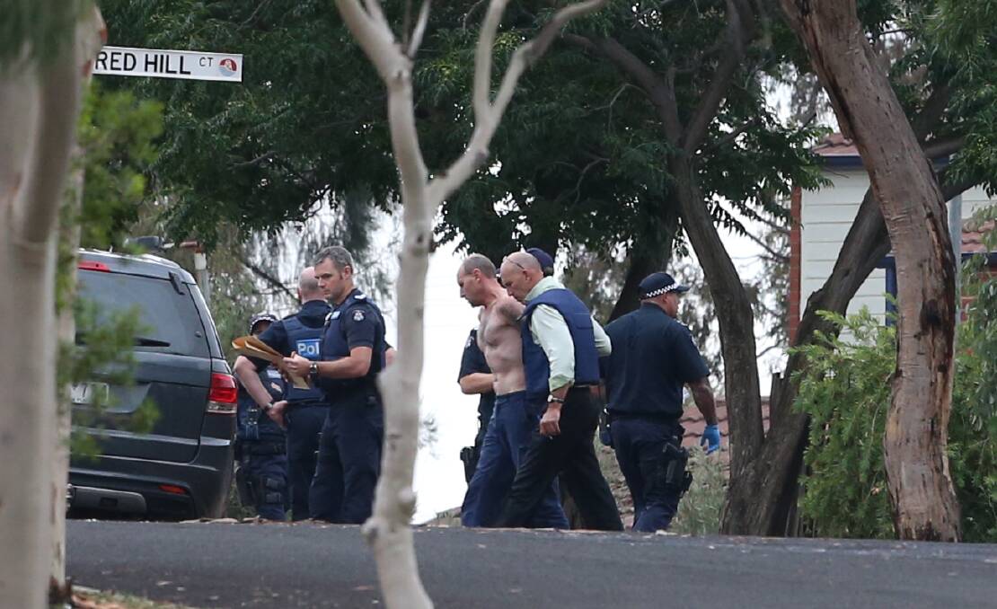 Ricky John Darmody is taken into custody after January's siege in Eaglehawk, where a bullet fired from his sawn off rifle ricocheted into a neighbour's leg.