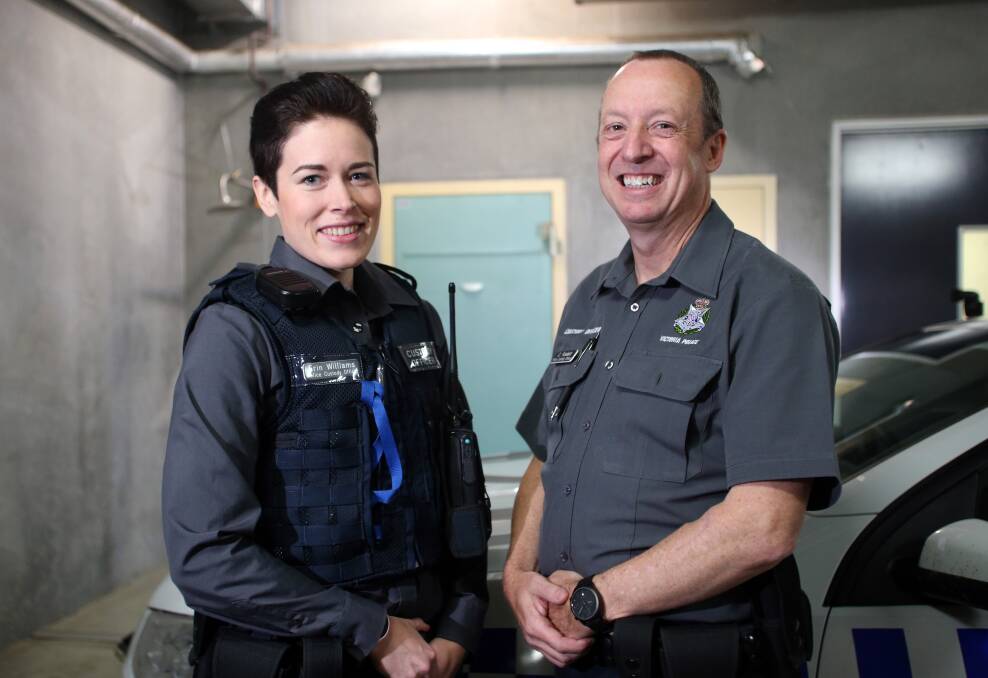 COMMITTED: Bendigo police custody offers Erin Williams and Conrad Foskett are among the 21 managing the cells at the local police station. Picture: GLENN DANIELS