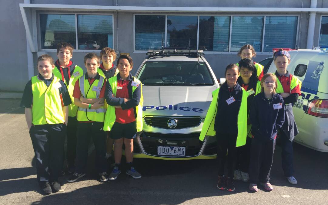 Lightning Reef Primary School students enjoy a visit to Bendigo police station on Thursday morning.