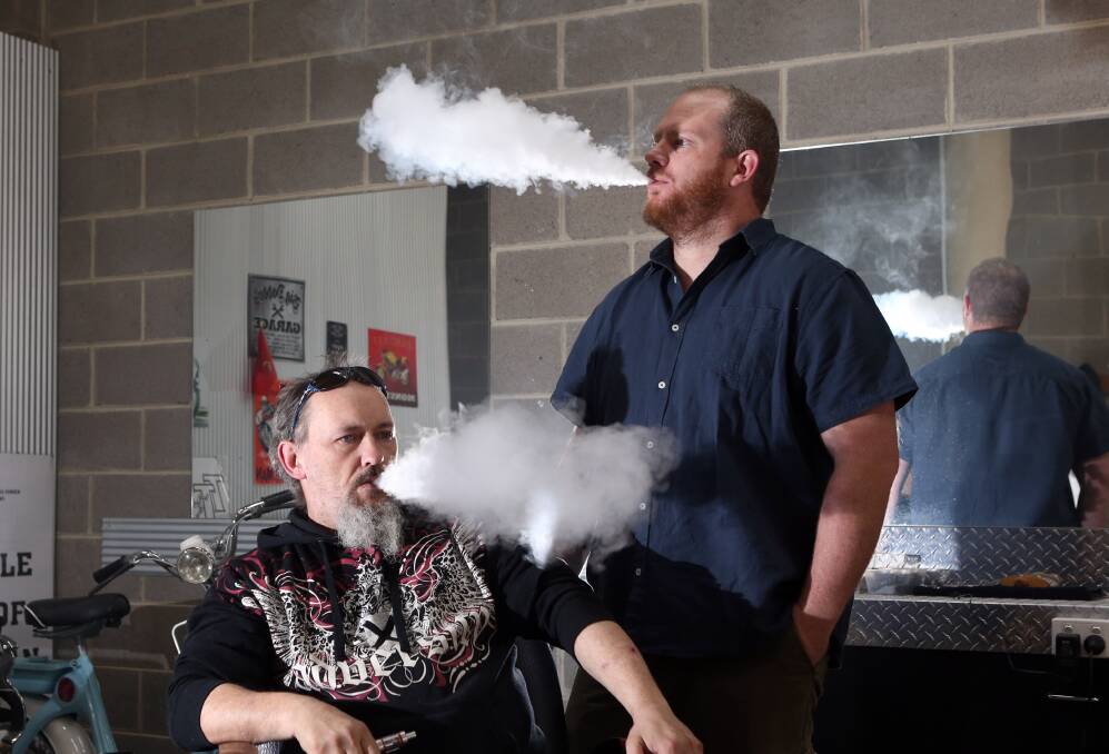 Vape Anarchy owner Alastair Hyde (right) is disappointed at another setback to legalising nicotine in e-cigarettes. Picture: GLENN DANIELS