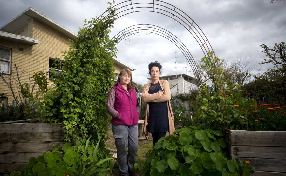 Old Church on the Hill volunteers Jane Ineson and Elizabeth Conway encourage people to respect the community garden in Quarry Hill. Picture: DARREN HOWE