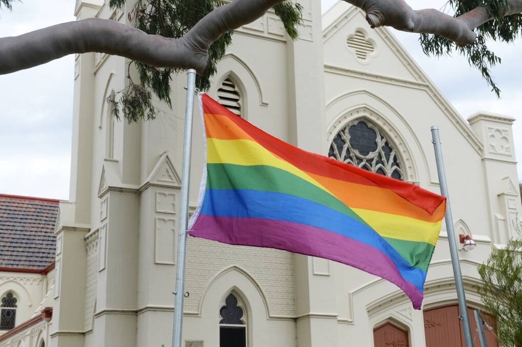 The rainbow flag flies in front of St Andrew's Uniting Church on Myers Street. Picture: DARREN HOWE