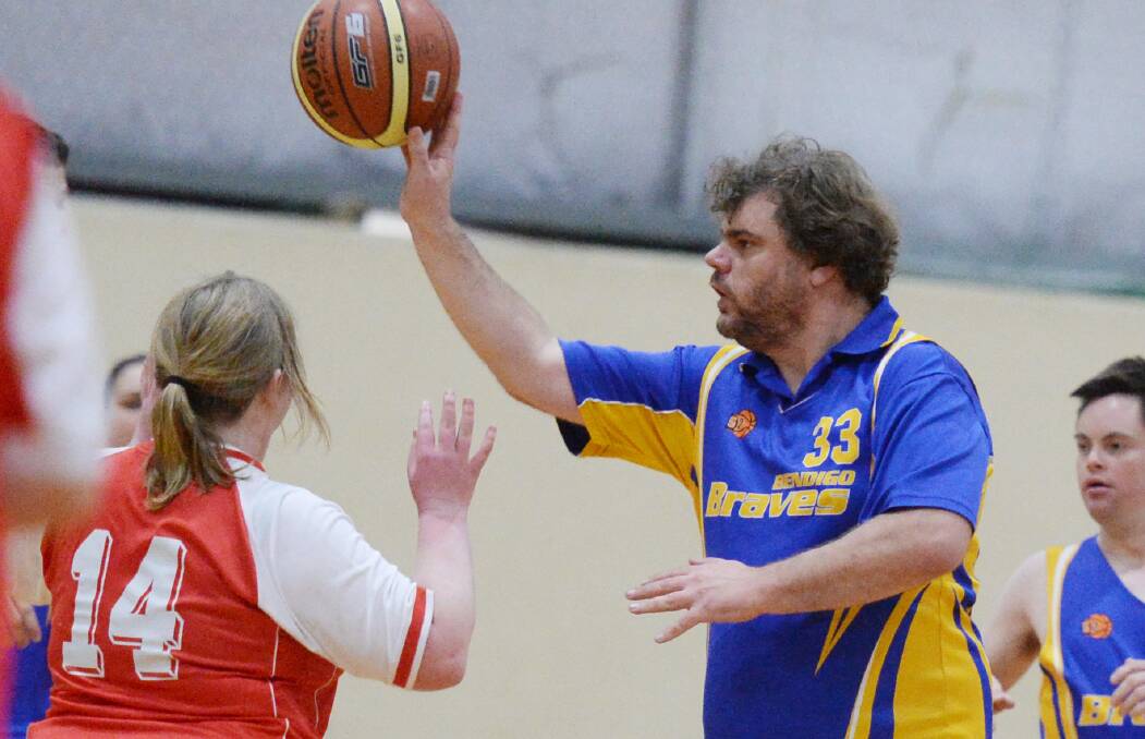 PASS: Drew in action for Bendigo Braves Blue against Kalianna in the all-Bendigo match at the Access All Abilities tournament. Picture: DARREN HOWE  