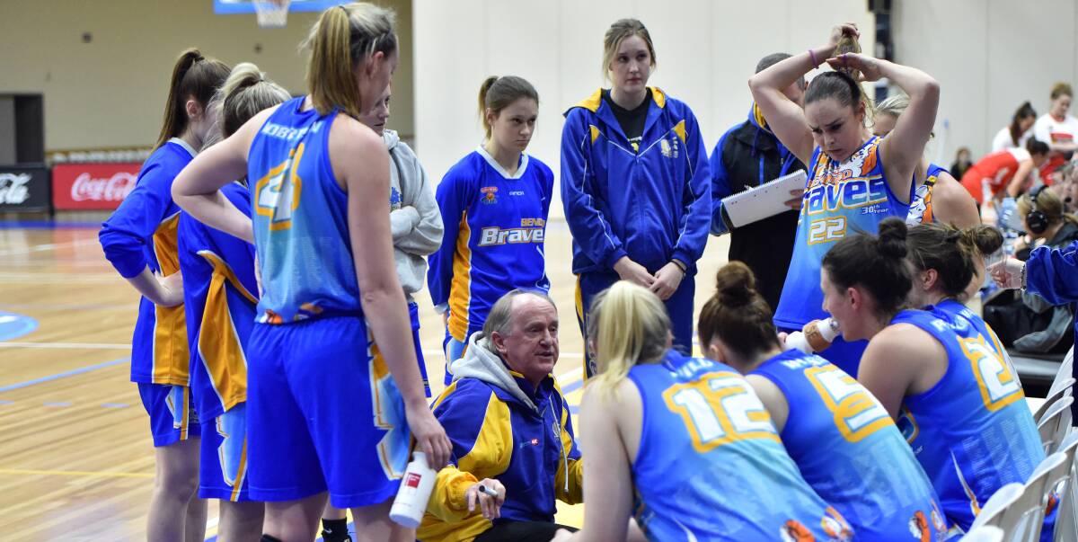 TIME-OUT: Bernie Harrower talks to the Champions IGA Bendigo Lady Braves in Friday's clash with Launceston Tornadoes at Bendigo Stadium. Picture: BILL CONROY