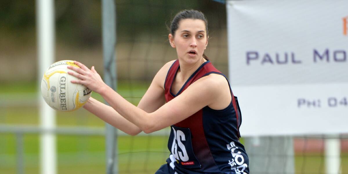 FOCUSED: Sandhurst goalshooter Kelsey Sartori played a key role in her club's A-grade victory at Strathfieldsaye in Saturday's start to the 12th round in the Bendigo Football Netball League season. Picture: BILL CONROY