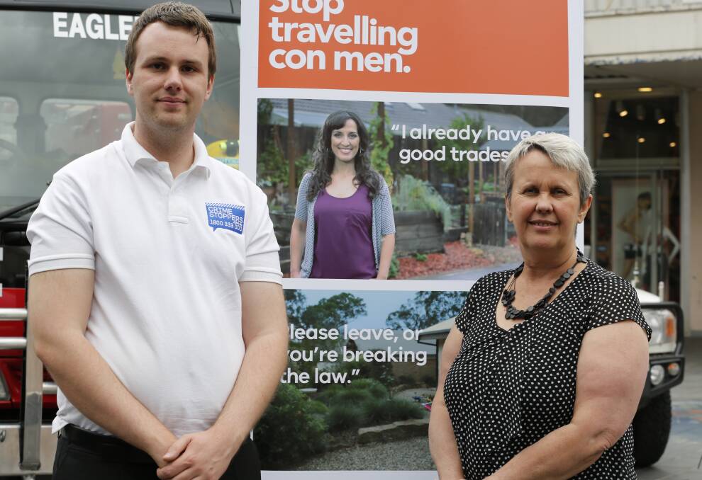 WATCH OUT: Chris Plumridge, of Crime Stoppers Victoria and Angela Williams of Consumer Affairs Victoria warn the public of travelling con men. Picture: EMMA D'AGOSTINO