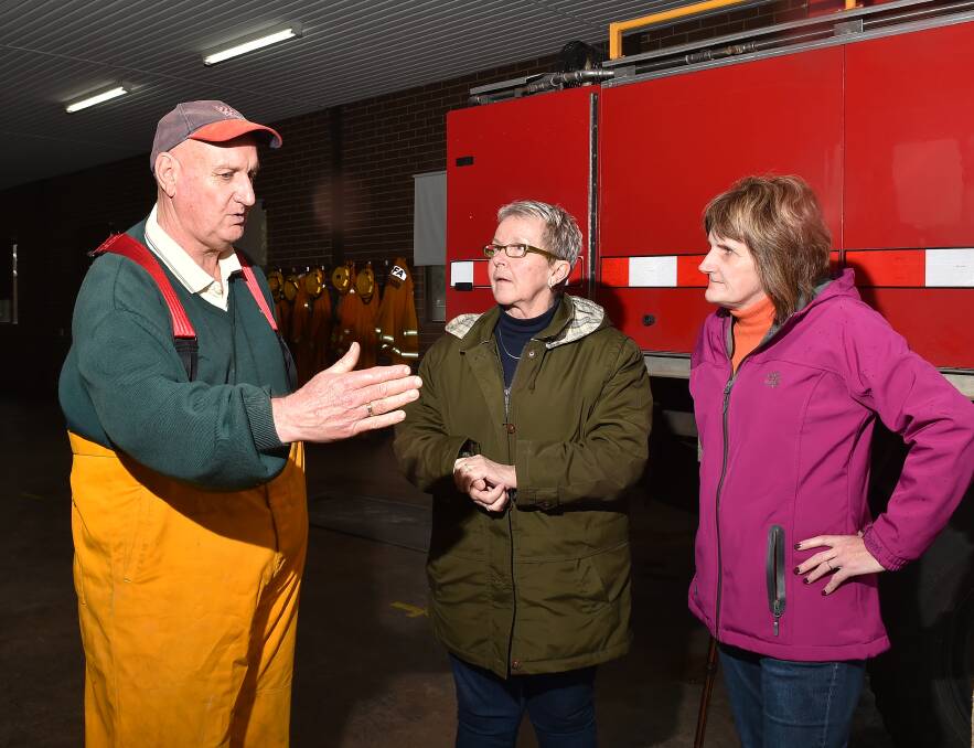 Carisbrook Fire Brigade Captain Ian Boucher with Central Goldfields Shire Councillors Paula Nixon and Helen Broad. Picture: NONI HYETT