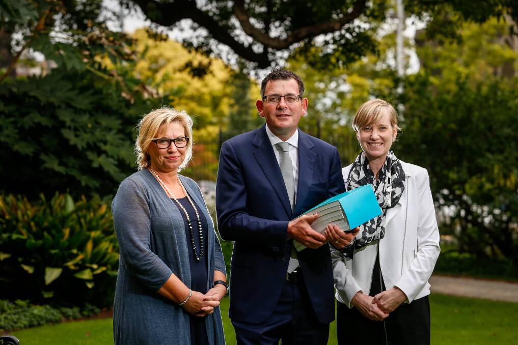 Premier Daniel Andrews, Minister for Prevention of Family Violence Fiona Richardson and victim advocate Rosie Batty with the findings of the Royal Commission into Family Violence. 