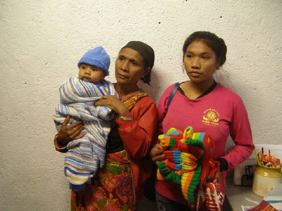 Recipients of the garments in East Timor. Picture: SUPPLIED