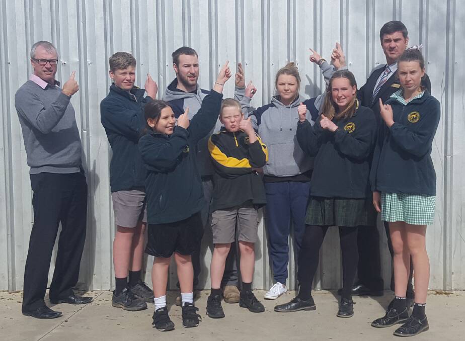 GYM TIME: East Loddon P-12 College assistant principal Scott Wilkinson, principal Steve Leed and school captains outside their 'dingy' gymnasium. Picture: SUPPLIED
