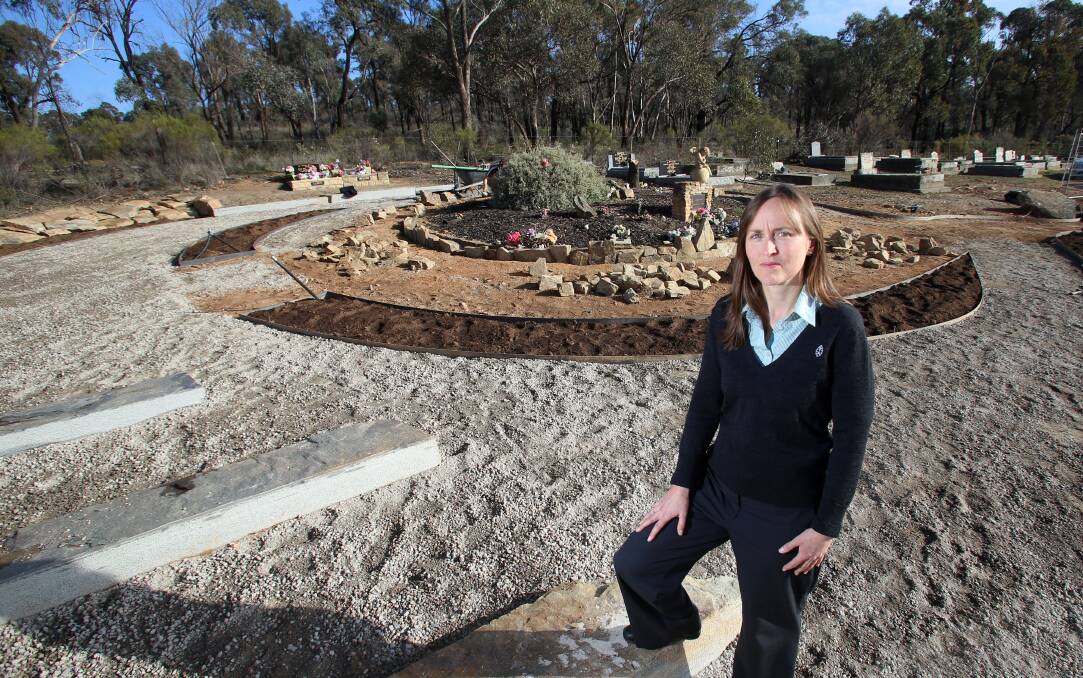 GUARDIAN ANGELS: Remembrance Parks Central Victoria business analyst Joanne Trickey at the Garden of Angels at Bendigo Cemetery, which is being redeveloped. Picture: GLENN DANIELS