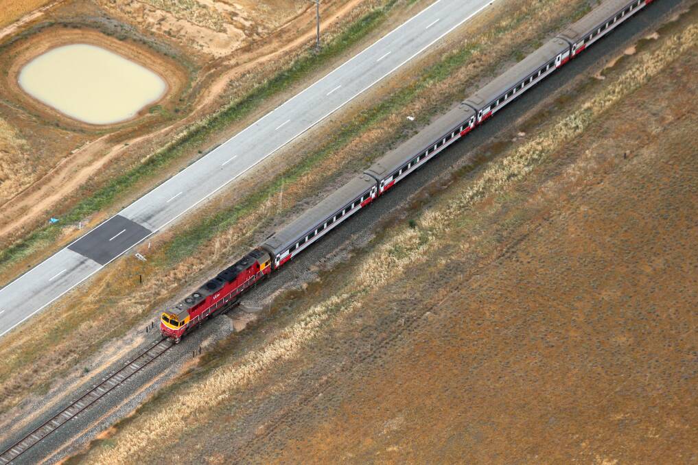 IMPROVING TRANSPORT: Aerial view of a Swan Hill V/Line train north of Bendigo. Picture: GLENN DANIELS