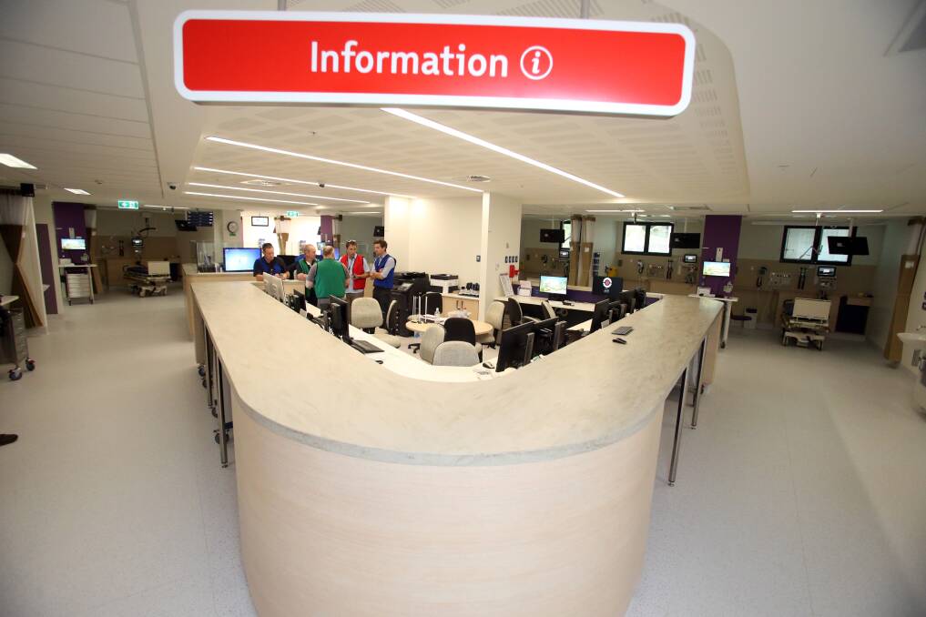 Staff familiarise themselves with the so-called 'fishbowl', the nerve centre of the emergency department at the new hospital. Picture: GLENN DANIELS
