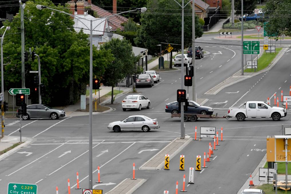 Traffic management is in place at Arnold Street between Barnard and Stewart Streets. Picture: DARREN HOWE