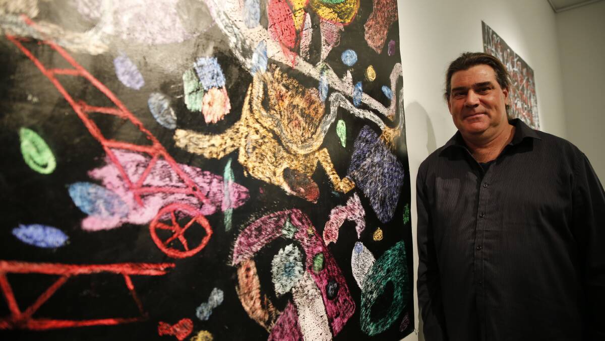 Julie Miller Markoff Visual Arts Award recipient Tony Day with The Story of the Creek, one of his works being exhibited at the La Trobe Visual Arts Centre. Picture: EMMA D'AGOSTINO
